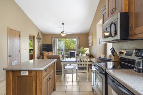 Whip up a delicious meal in the fully equipped kitchen - the heart of your cozy condo that's sure to inspire your inner chef!