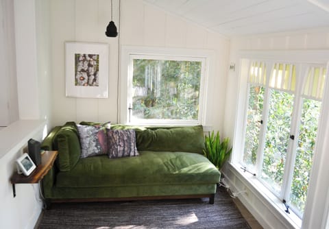 Relax in the comfy chaise lounge in the sun room.