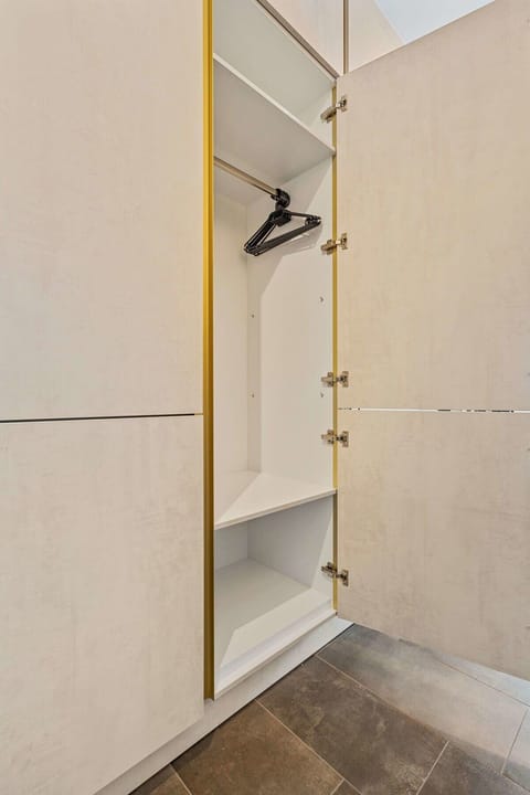 "Stash away your travel gear in our spacious, modern closet.