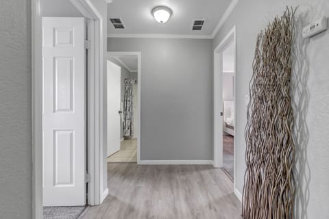 Hallway to bathroom in second floor area.