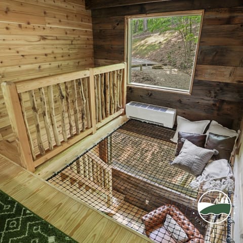 Look at the screen to watch movies or through the skylight from this whimsical net!