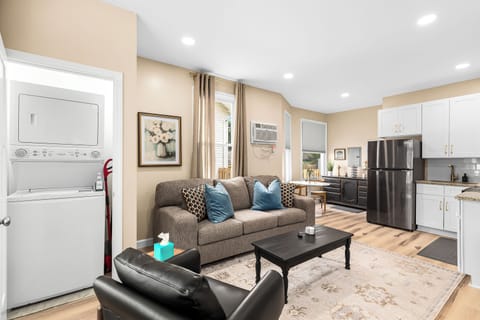 Relax in our inviting living room furnished with cozy seating and a smart TV for your entertainment.