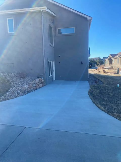 Parking space and private entrance. Room for 2 small cars or one large car.