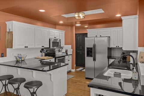  A harmonious blend of style and functionality, this kitchen is a testament to modern design