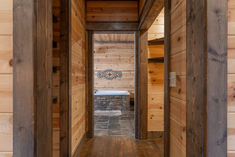 Attached ensuite is connected by a short hallway with a shelved closet on the left and a walk in closet on the right. Unpack and stay awhile!