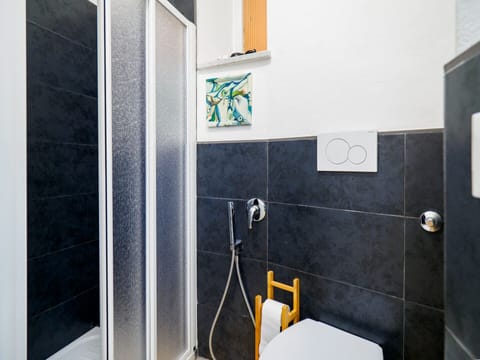 Shower, eco-friendly toiletries, hair dryer, bidet