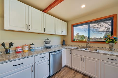 Fridge, stovetop, dishwasher, coffee/tea maker