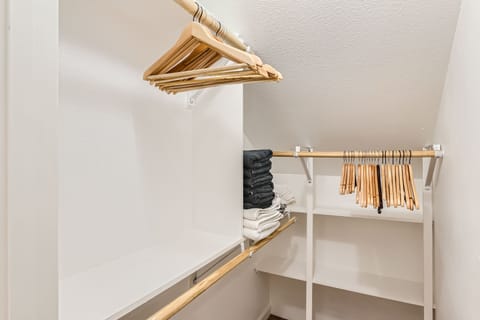 A spacious walk-in closet for your belongings.
