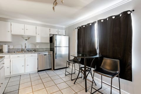 Kitchen overlooks the back yard and bike path