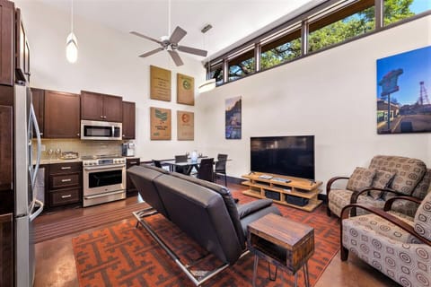 Comfy seating area. Leather futon folds down for sleeping