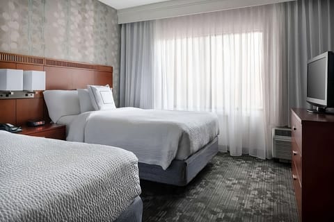Recharge on crisp linens in a bright, restful double room.