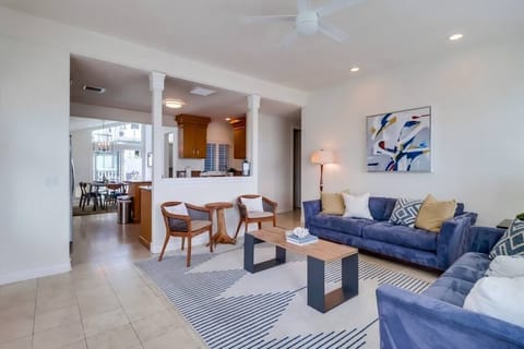 This living area is ideal for entertaining as it opens up to the kitchen.