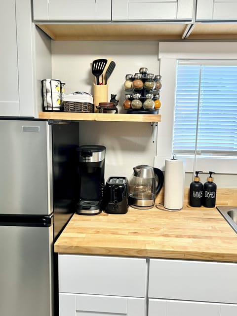 Fridge, microwave, stovetop, coffee/tea maker