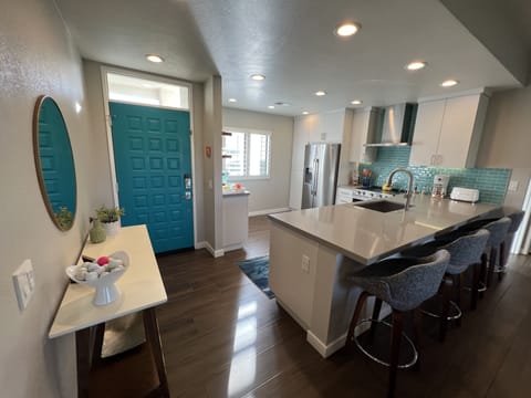 Entryway with large open kitchen, 4 new barstools and dimmers!