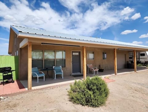 Front patio with BBQ grill and view of Turtleback Mountain