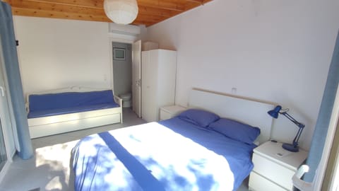 Studio with double bed and sofa which converts to two child beds.  Bathroom.  