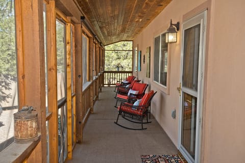 Screened Porch with Rocking Chairs (1)