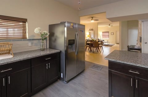 Large open area from the kitchen to dining and living  areas