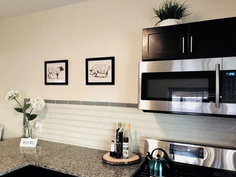 Clean and tidy kitchen with cute decorations, all set up for cooking!
