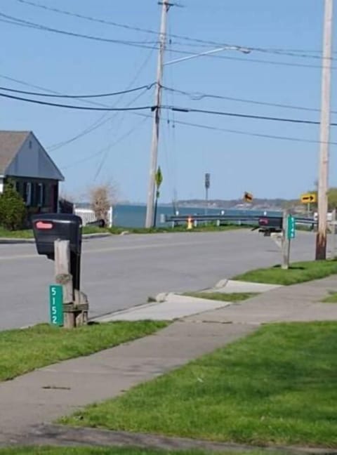Photo taken in the front yard showing proximity to lake.
