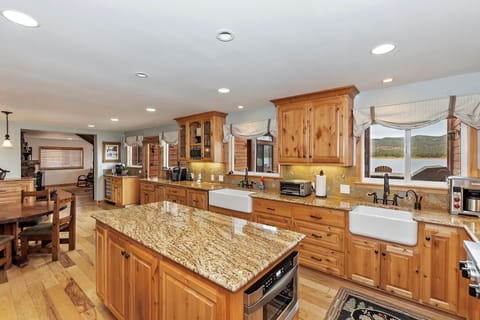 Kitchen features an island and modern appliances.