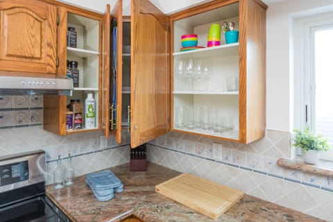 The kitchen is fully equipped for meals and eating in