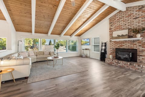 Upstairs family room with fireplace , vaulted ceilings 
