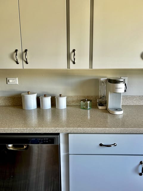 Kuerig coffee maker with pods provided.