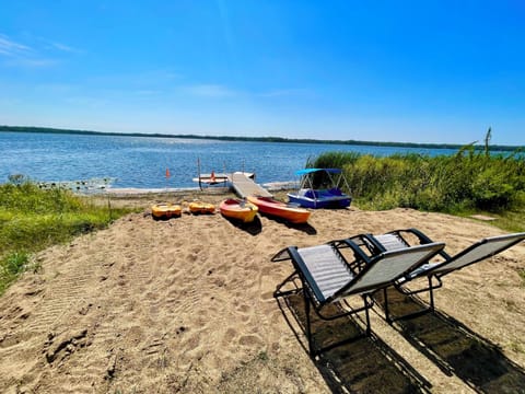 On the beach, sun loungers, beach towels