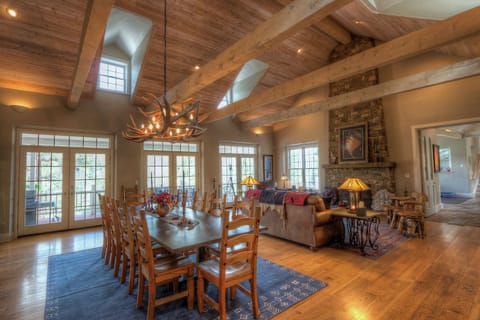 Main Living and Dining Spaces - Deck access and wood burning fireplace