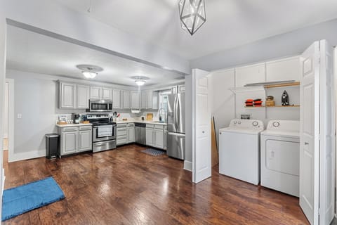 View of kitchen with bonus washer and dryer