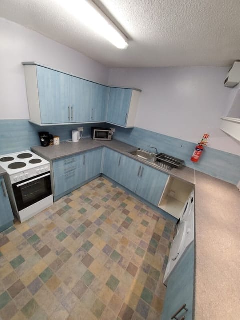 2nd kitchen with washing machine and dryer