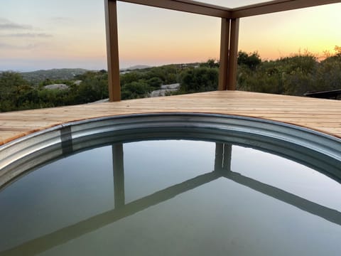 Enjoy a soak and a view from the deck