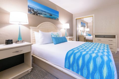 Unwind into crisp linens and coastal tones for deep sleep.