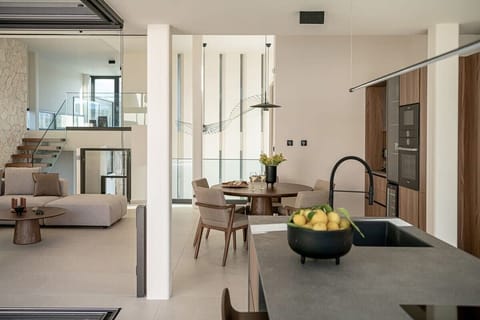 Experience culinary opulence in our fully equipped luxury kitchen, where every detail is meticulously crafted to elevate your cooking experience to new heights.