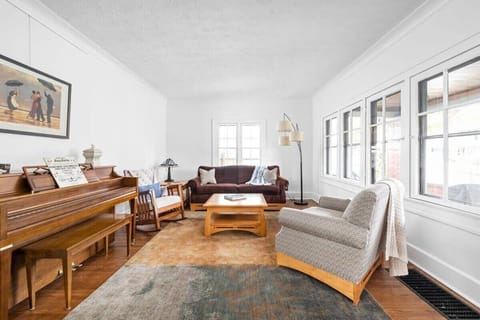 Our living room is ready for you to unwind. Take a seat on our comfortable sofas, enjoy the spacious surroundings, and make yourself at home.