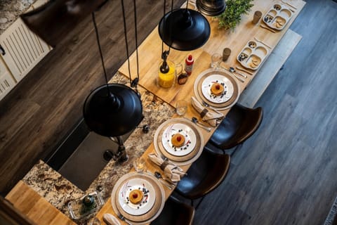 Family gathers around the table, sharing meals and joyful stories.