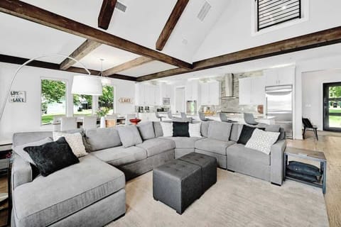 Large living area open to kitchen and dining.