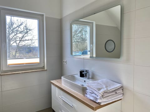 Bathtub, hair dryer, towels