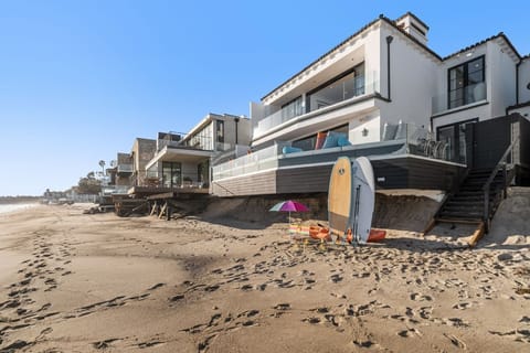 On the beach, sun loungers, beach towels