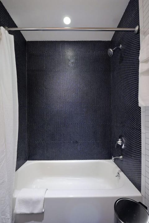 Combined shower/tub