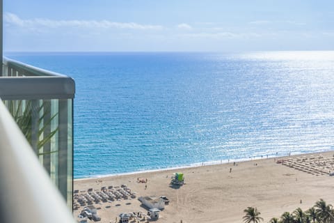 On the beach, sun loungers, beach towels