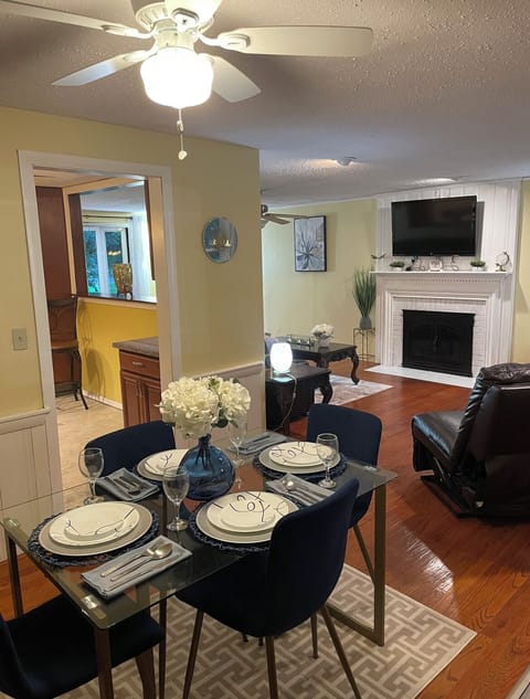 Comfortable + classy living room/dining room so you can reconnect w/ loved ones