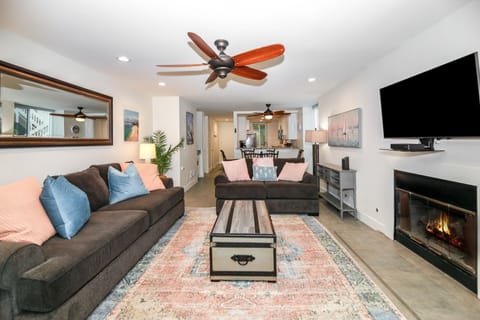 Relax in coastal elegance surrounded by natural light and ocean hues