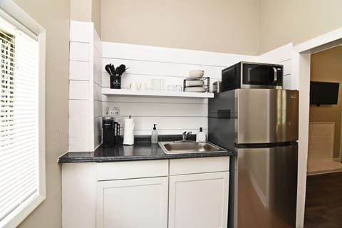 Fridge, microwave, stovetop, coffee/tea maker