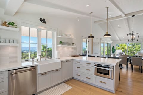 Kitchen - In the Main House, the kitchen features a double wide sink, convection oven and views that go on forever!