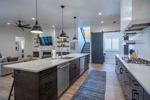 Kitchen is fully stocked with appliances and utensils to make mealtime a breeze