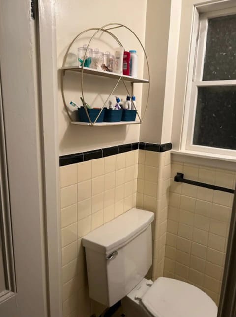 Combined shower/tub, hair dryer, towels, soap