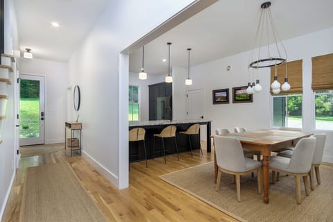 Entryway leading to kitchen and dining areas.