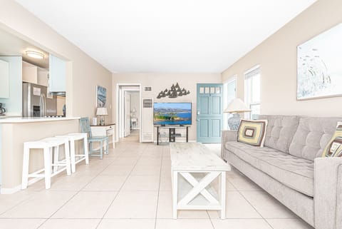 Breakfast bar seating overlooks kitchen headquarters.